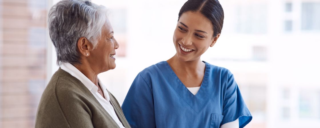 Nurse speaking to patient