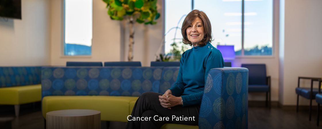 Cancer care patient sitting on couch