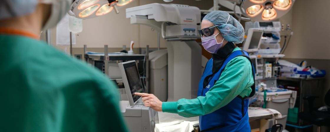 Surgeon using hospital equipment