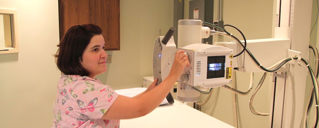 Nurse using hospital equipment