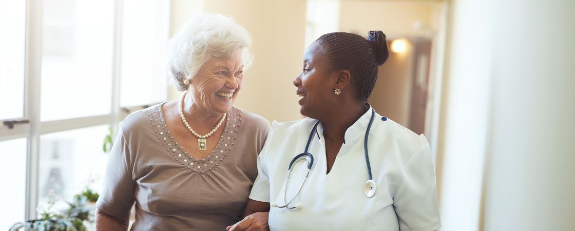 Nurse speaking to patient
