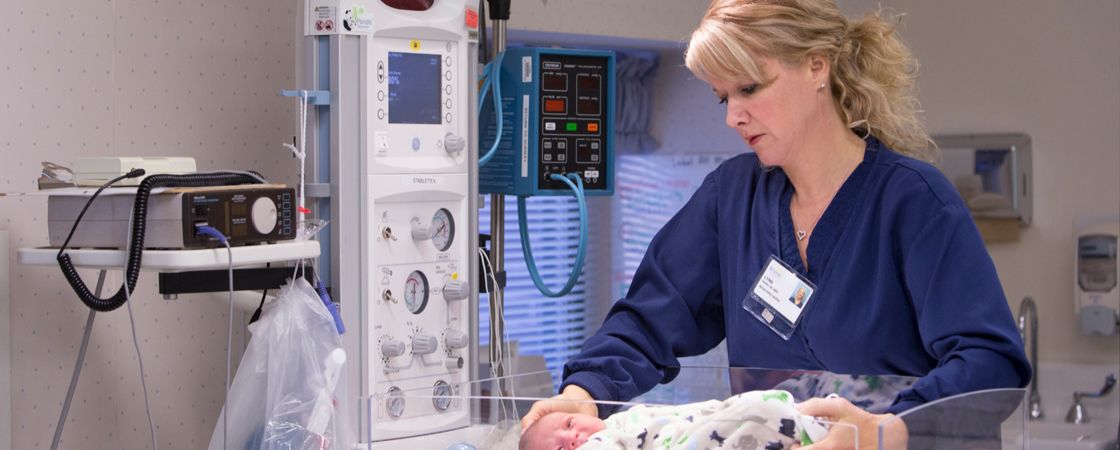 Nurse with infant baby