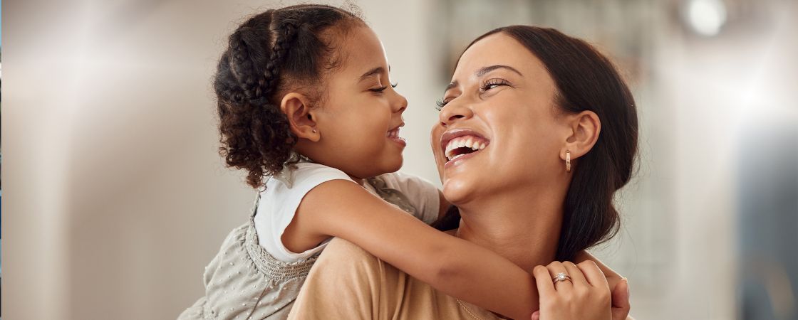 Mom and daughter hugging