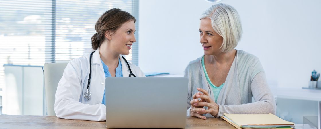 Doctor and patient on computer