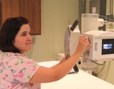 Nurse using medical equipment