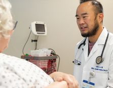 Doctor talking to elderly patient