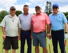 Smiling colleagues at a golf course