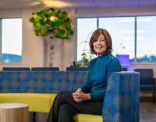 Cancer survivor sitting on couch