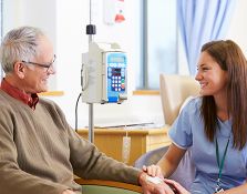 Nurse comforting patient