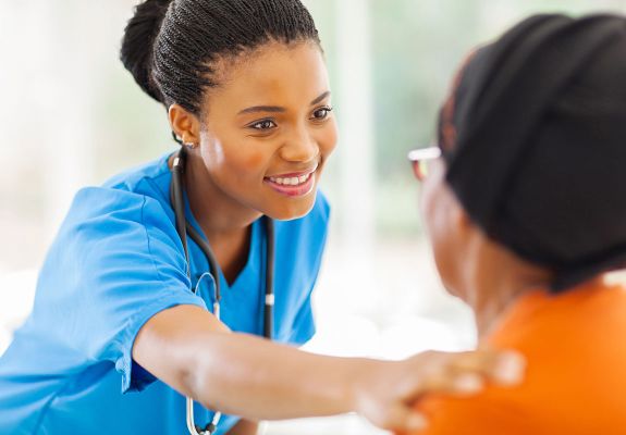 Nurse comforting patient