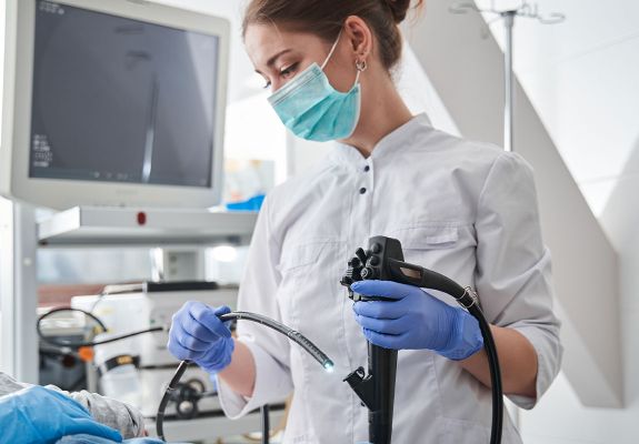 Nurse holding endoscopy tool 