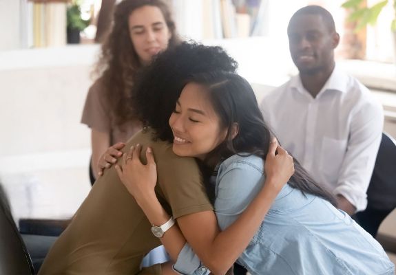 Two people hugging