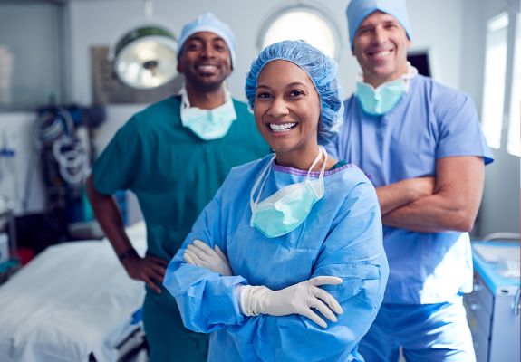 Surgeons standing in operating room