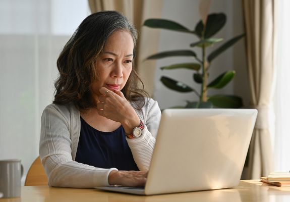 Woman on computer at home