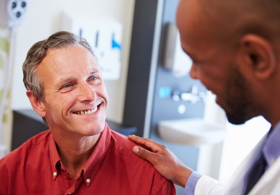 Doctor speaking to patient