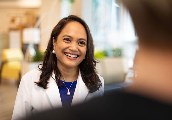 Doctor smiling at patient