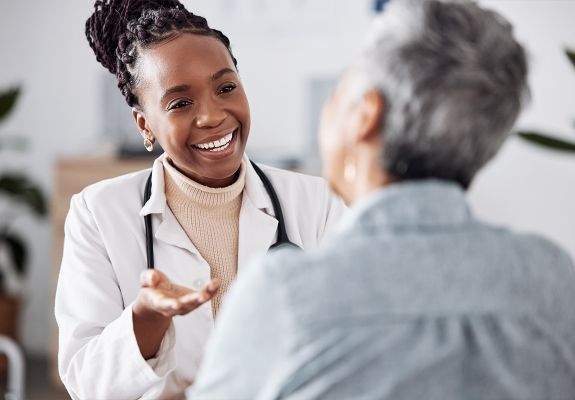 Doctor speaking to patient
