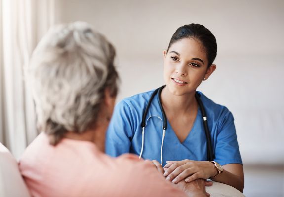 Nurse talking to patient